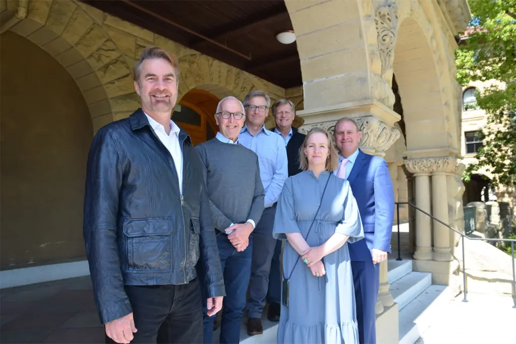 Civic entrepreneur Frank McCourt, Jr. (second from left) with members of the faculty steering committee, who will lead and oversee Stanford’s activities under Project Liberty’s Institute. From left to right, Erik Brynjolfsson, Rob Reich, Michael McFaul, Marietje Schaake, and Nathaniel Persily. (Image credit: Melissa Morgan)